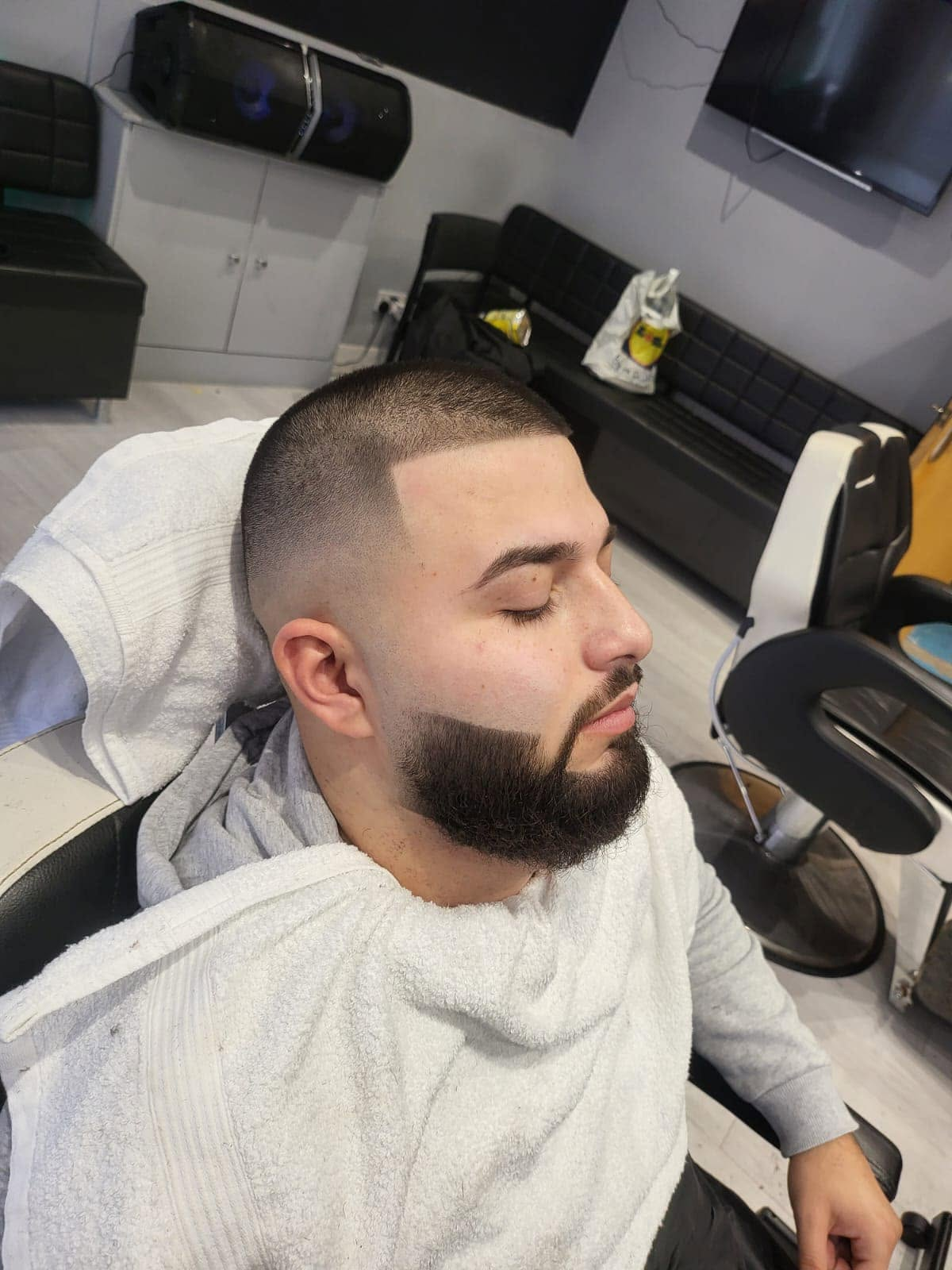 High skin fade with beard shape